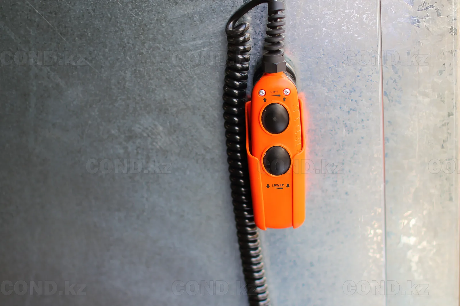 Remote control on a coiled cable