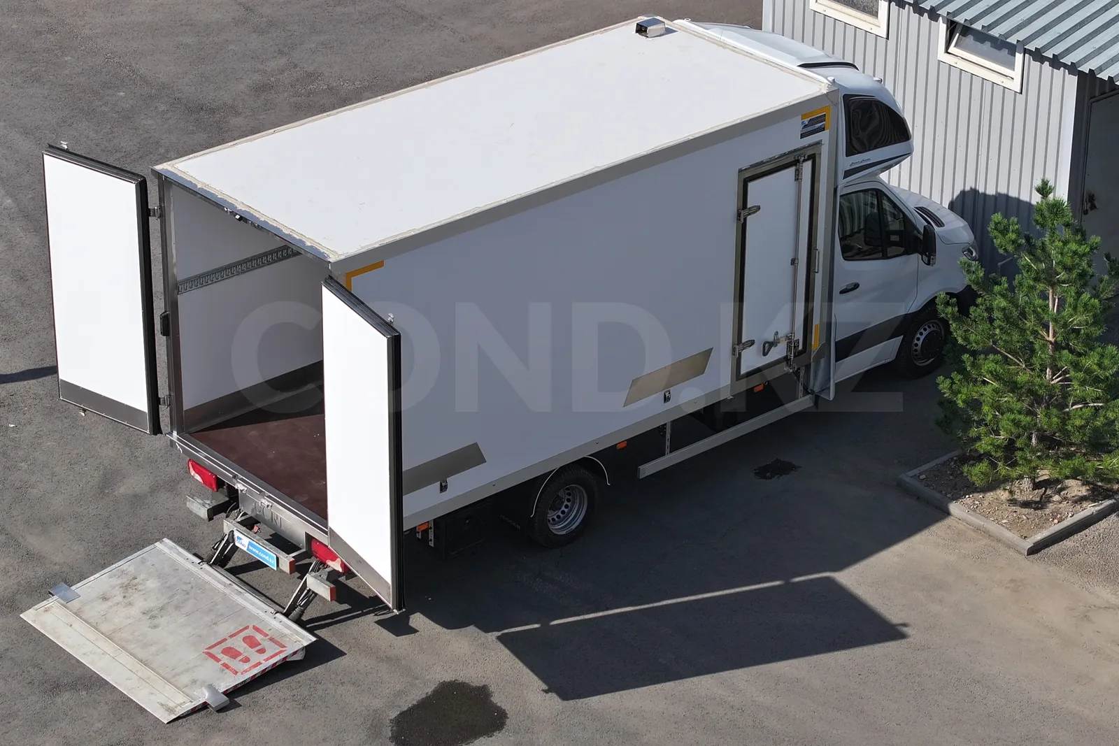 Mercedes-Benz Sprinter with a COND van body and a tail lift — platform lowered