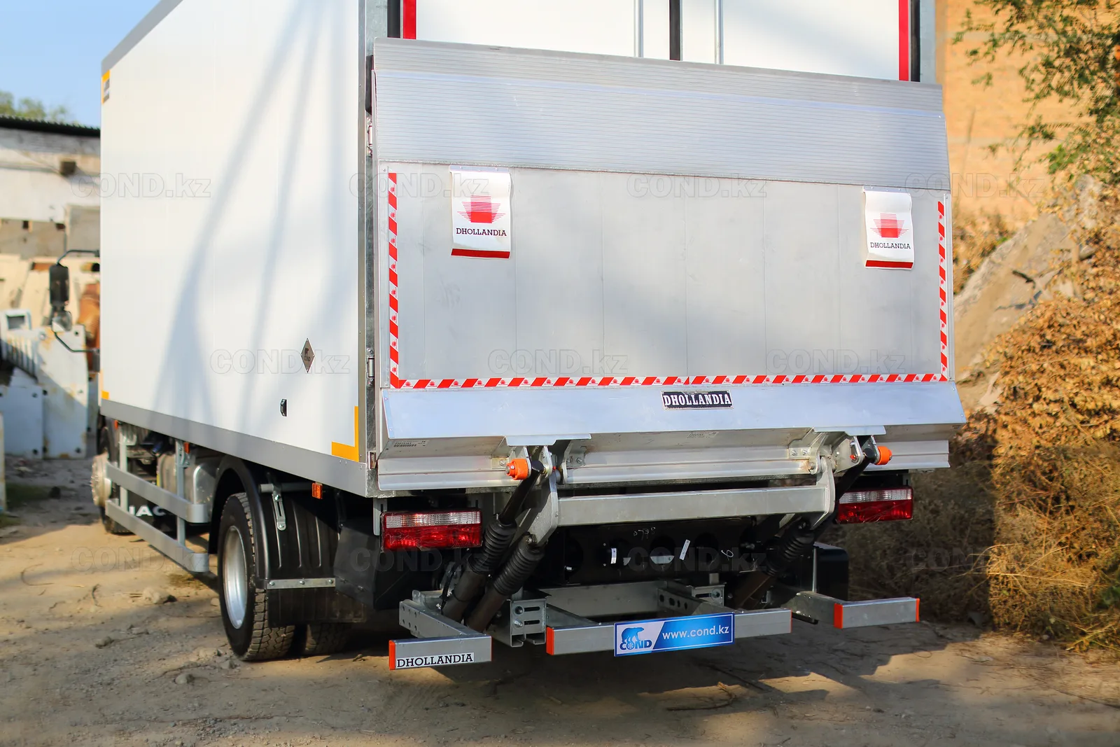 Dhollandia tail lift in the transport position on a JAC N120