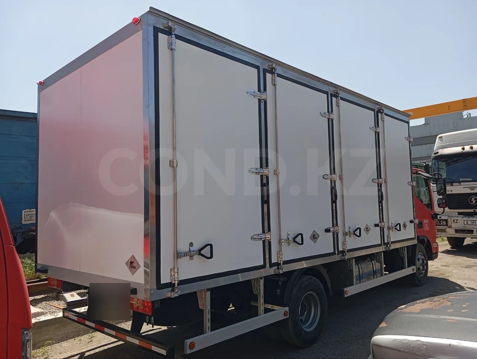 Beverage delivery body on a Foton Aumark chassis — the left side of the beverage body — COND