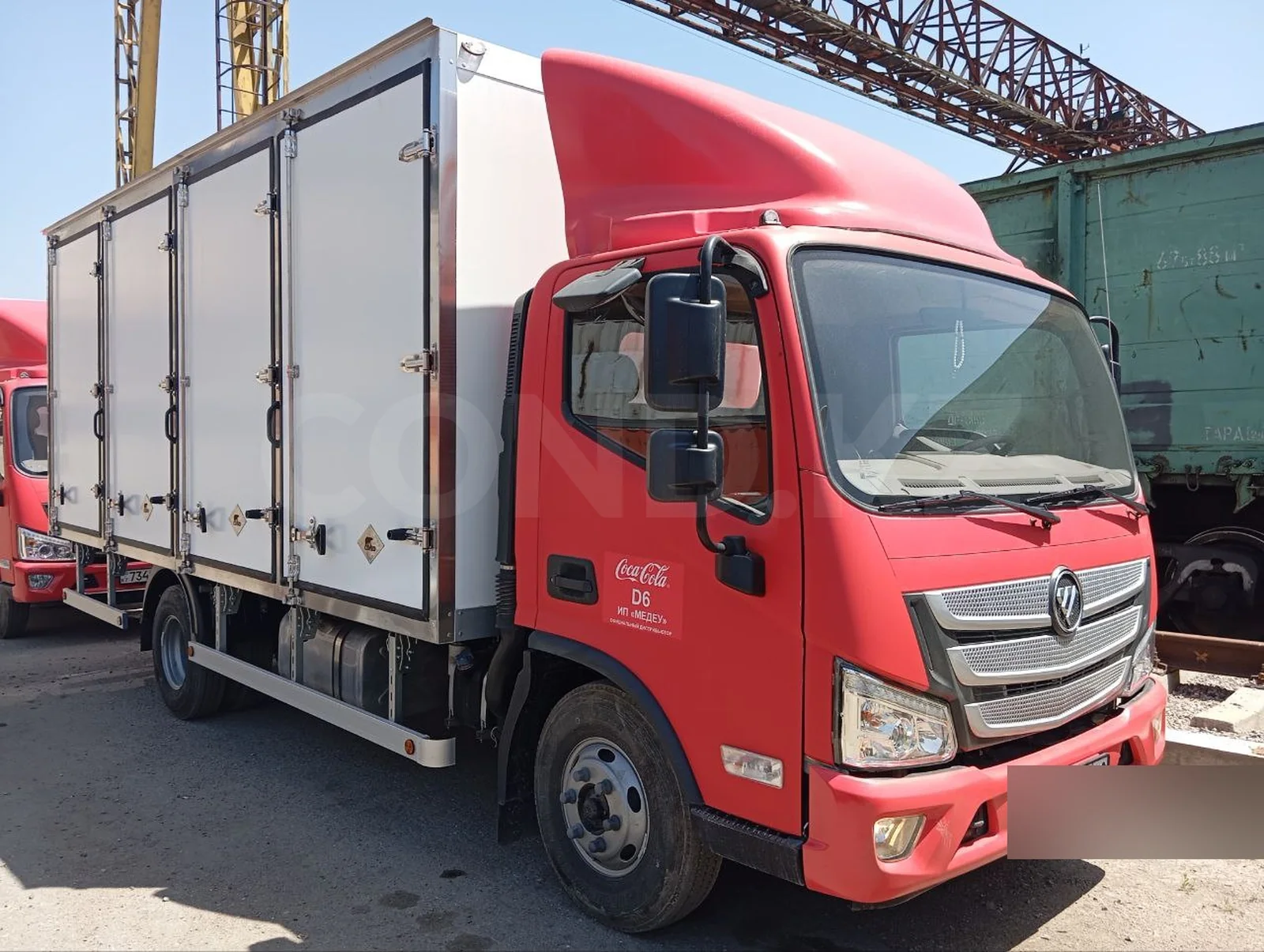 Beverage delivery body on a Foton Aumark chassis — the Foton cab and the body from the side — COND