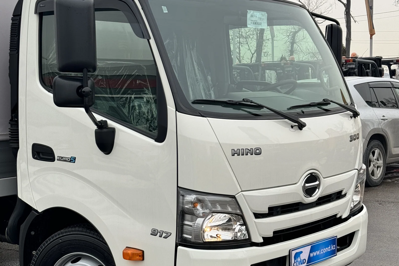 Curtain-side drop-side on a HINO 300 chassis — HINO 300 917 cab, Euro 5 — COND