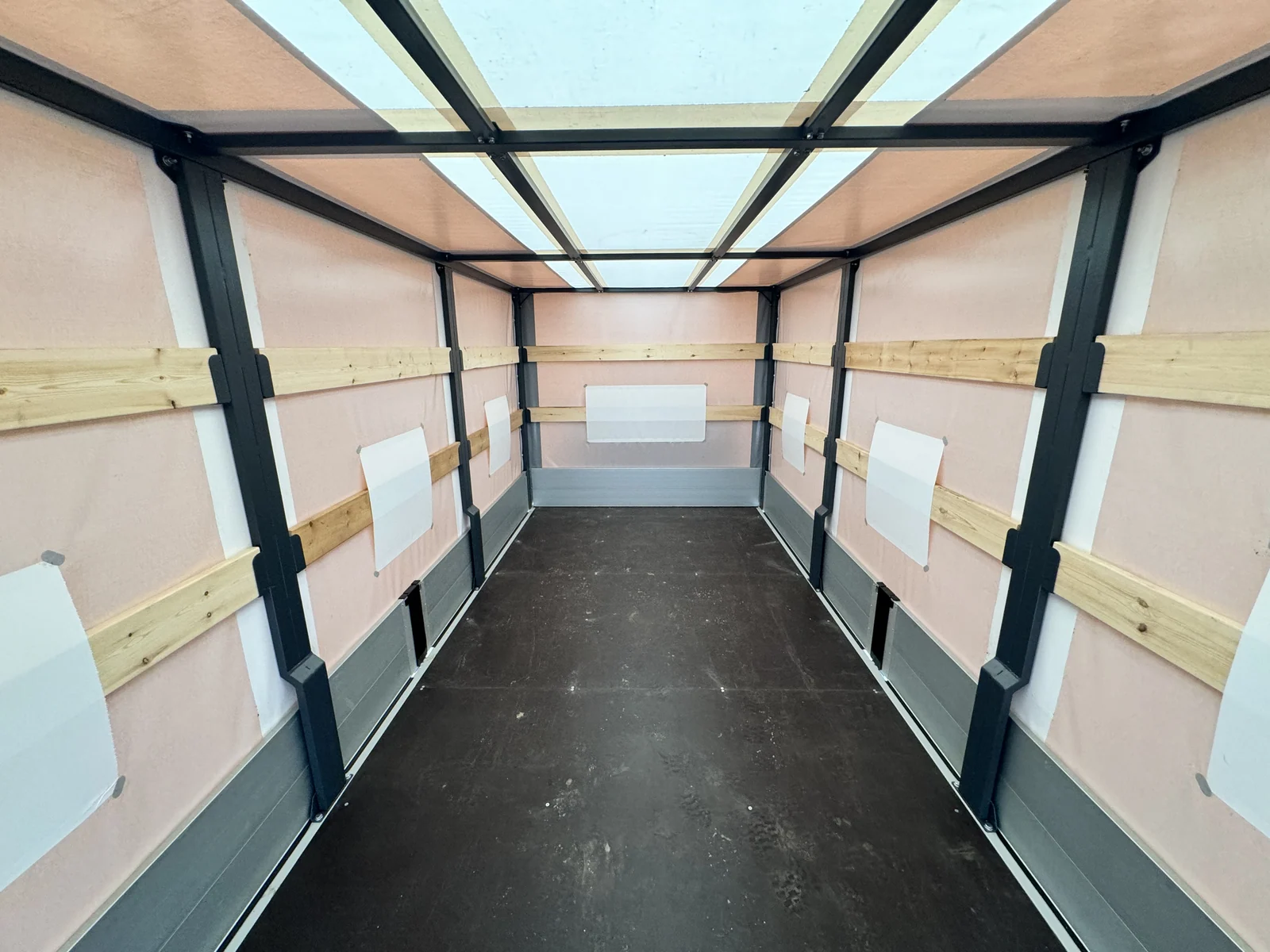 Curtain-side drop-side on a HINO 300 chassis — the platform from inside, full length — COND