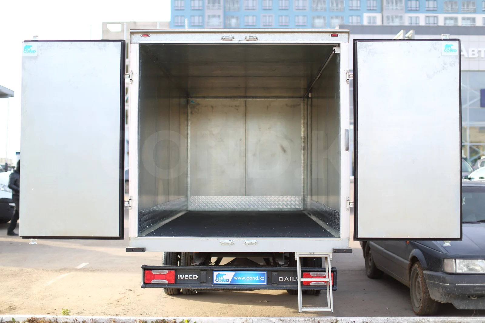 Iveco Daily 50C15 insulated van from the COND factory — doors open: the body inside, the chequered-aluminium floor — COND