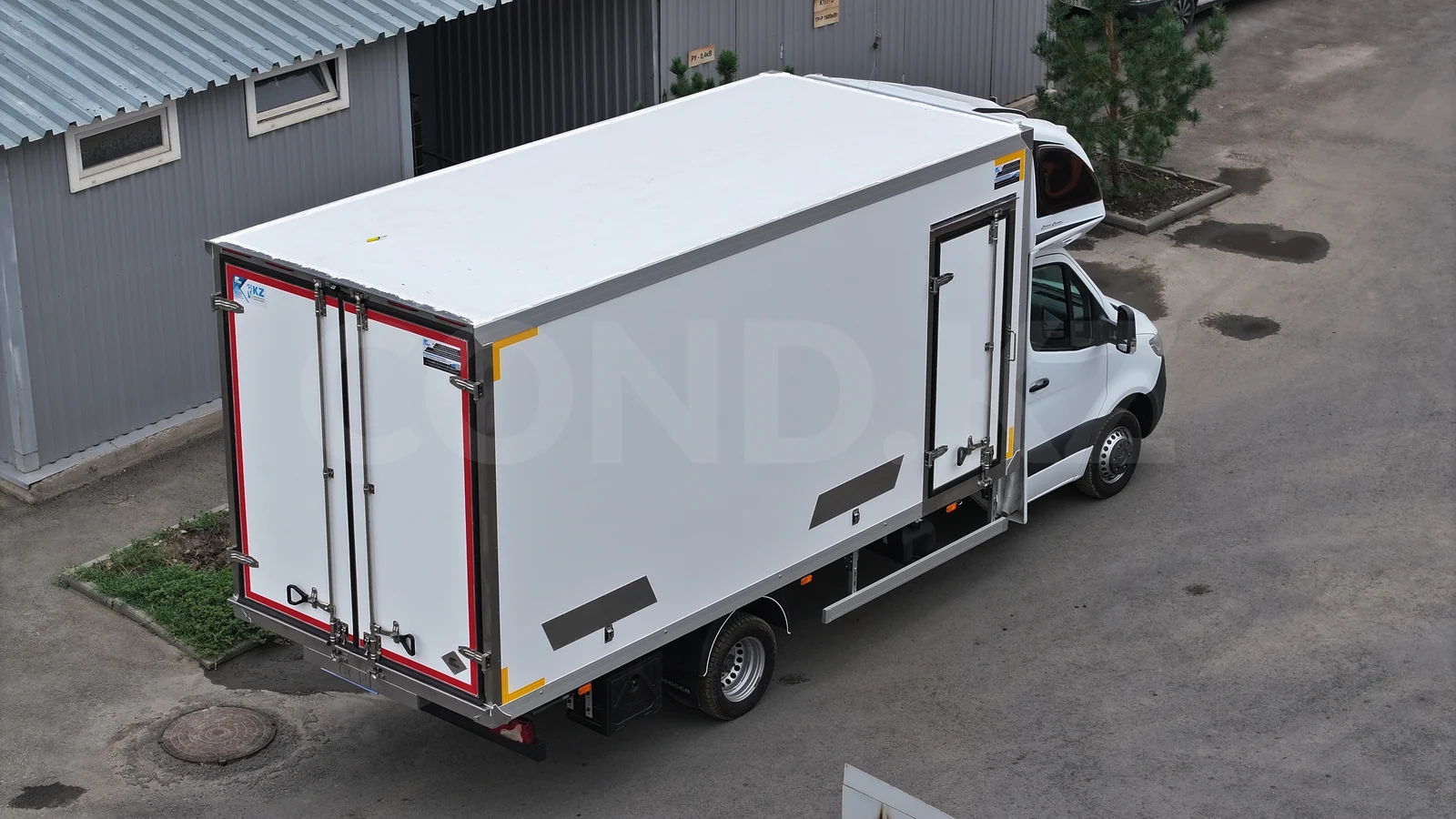 FRP insulated van on Mercedes-Benz Sprinter chassis — rear three-quarter view, swing doors and the glass-reinforced plastic body — COND