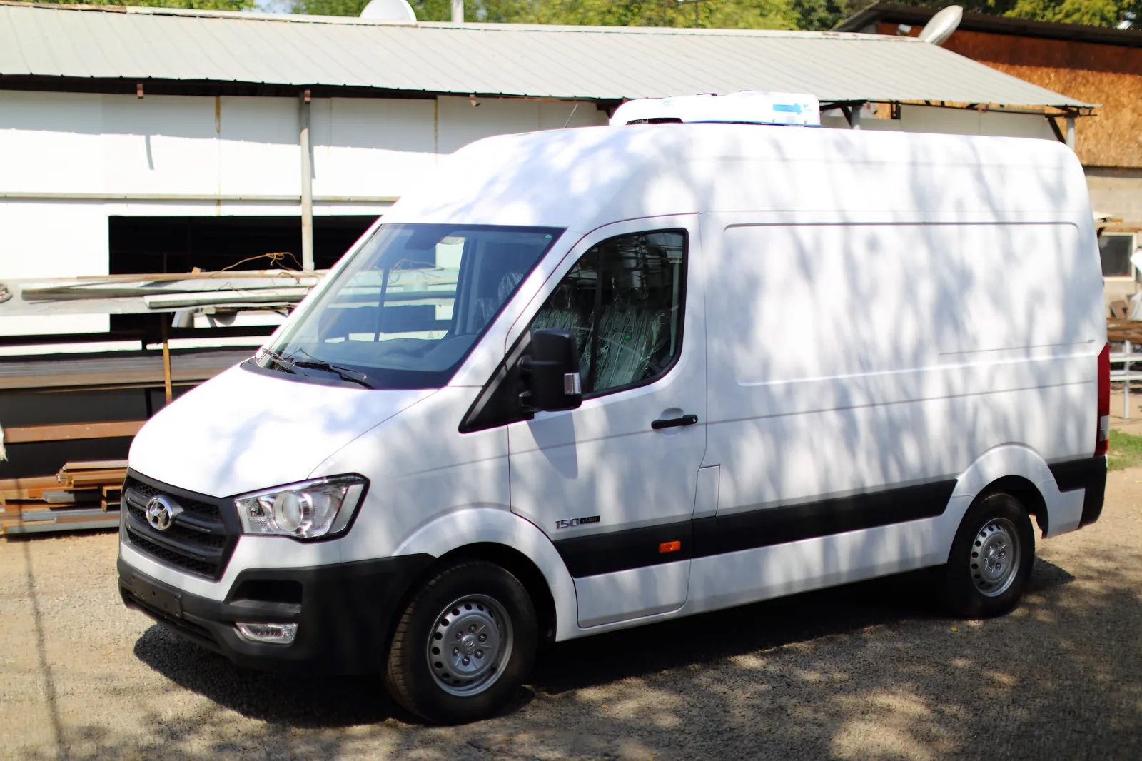 Hyundai H350 reefer converted from a panel van — after conversion, roof-mounted unit — COND