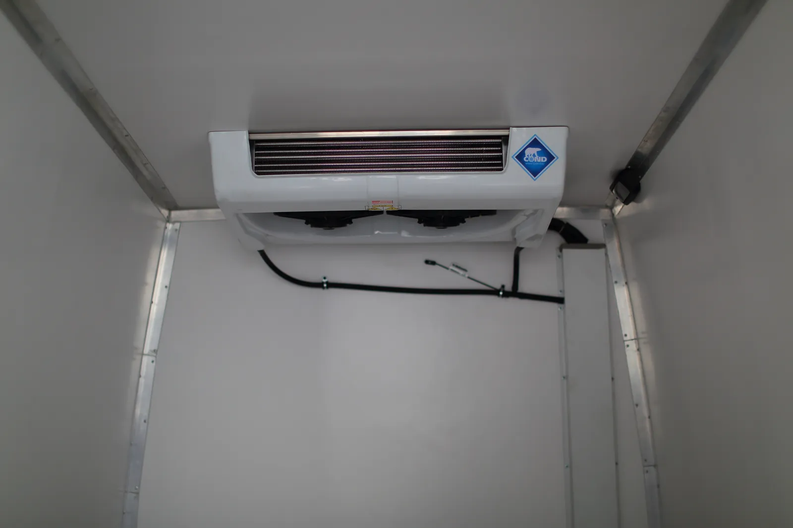 Iveco Daily 45C15 reefer converted from a panel van — evaporator under the ceiling, corner profiles — COND