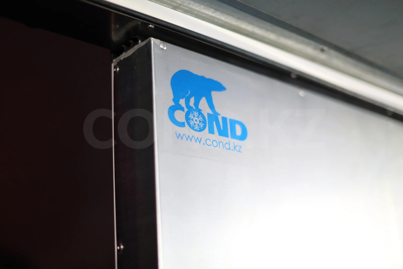Iveco Daily 50C15 dry-freight van from the COND factory — the COND badge on the side, close up — COND