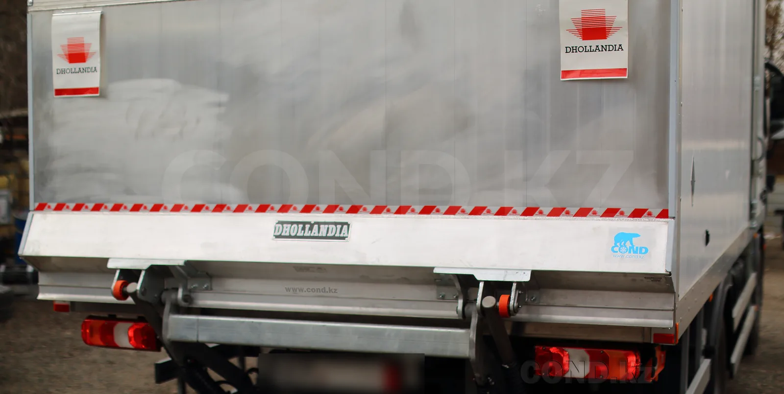 Dhollandia tail lift on a refrigerated Mercedes-Benz Actros — rear view