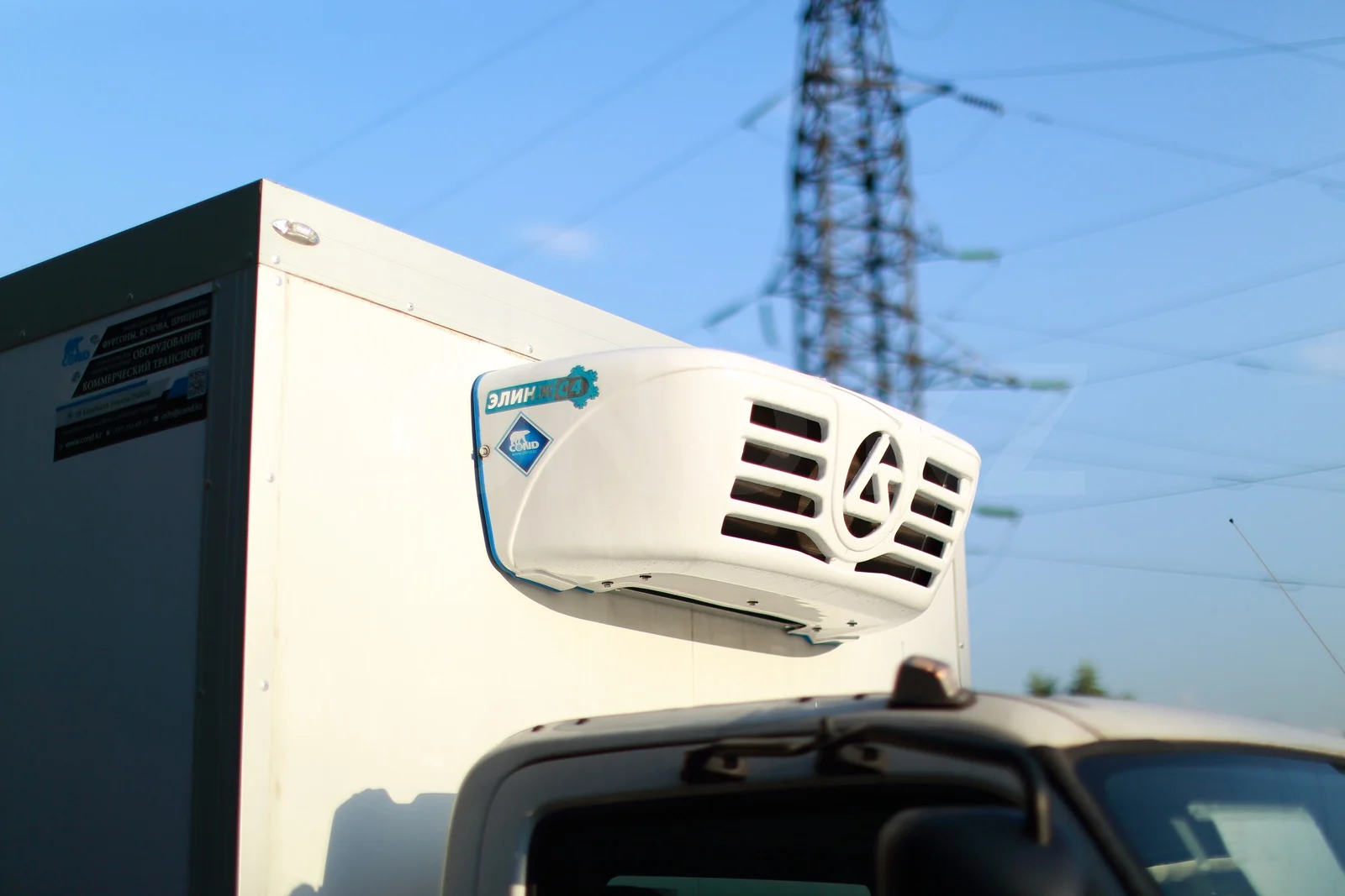 Refrigerated van on a HINO 300 with a strip curtain — the refrigeration unit, close up — COND