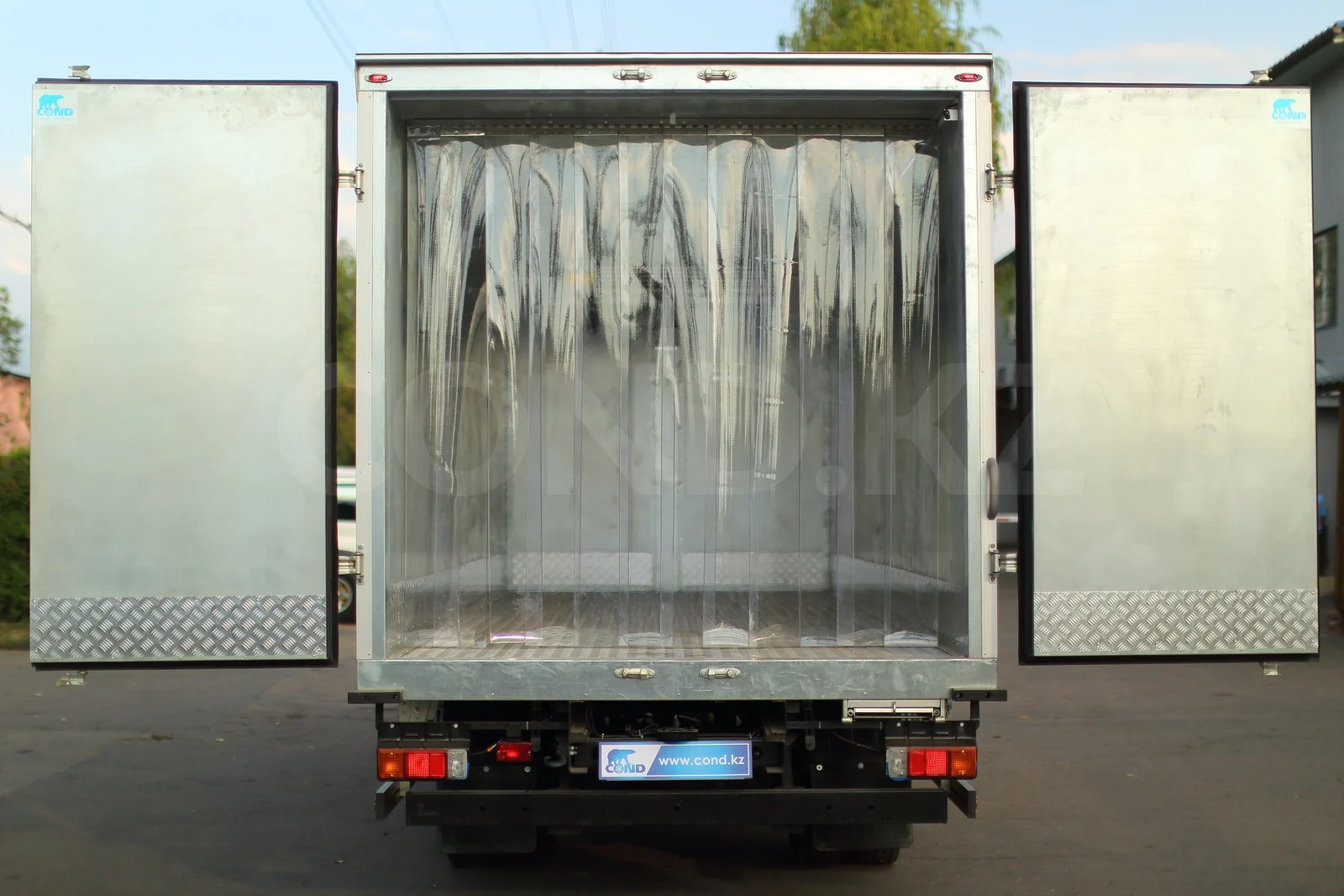 Refrigerated van on a HINO 300 with a strip curtain — the strip curtain in the rear opening, head on — COND