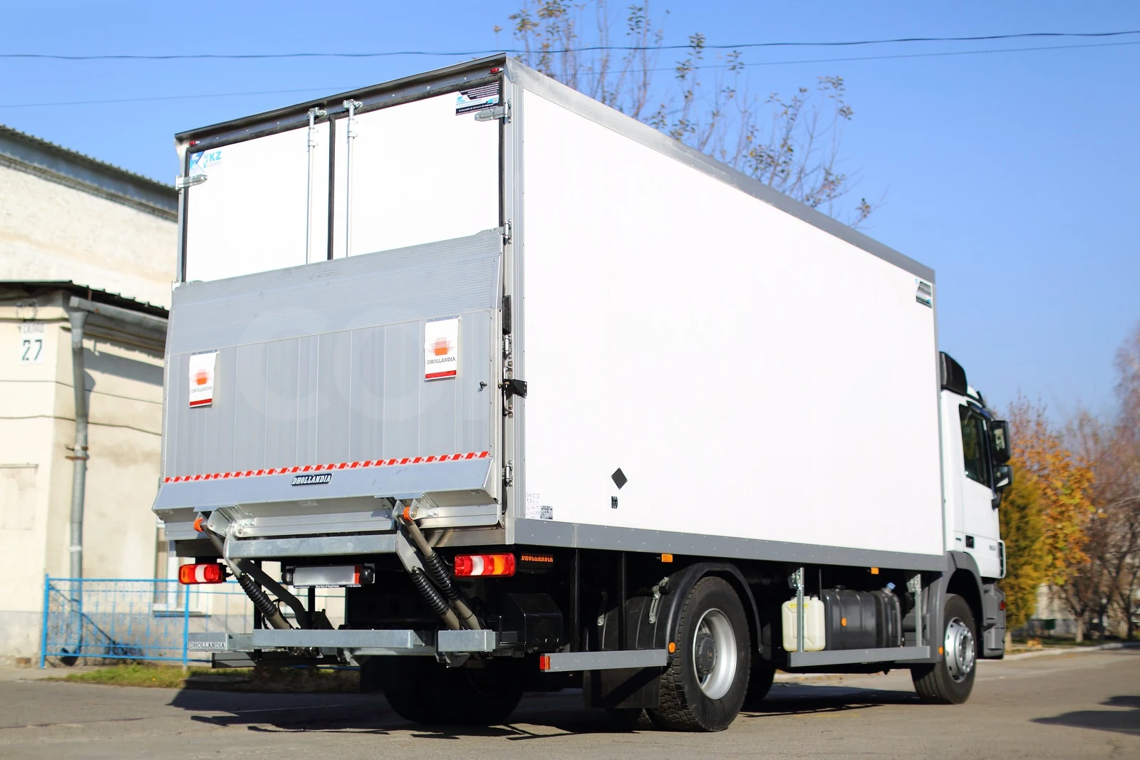Reefer body on a Mercedes-Benz Actros chassis — the Dhollandia tail lift in the folded position — COND
