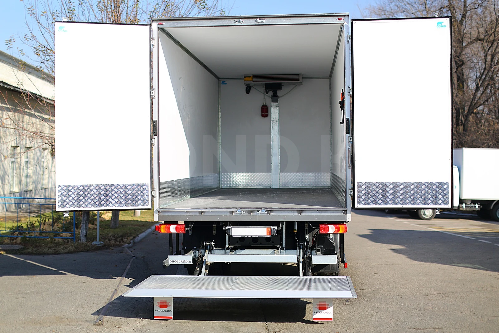 Reefer body on a Mercedes-Benz Actros chassis — rear doors open, tail-lift platform lowered — COND